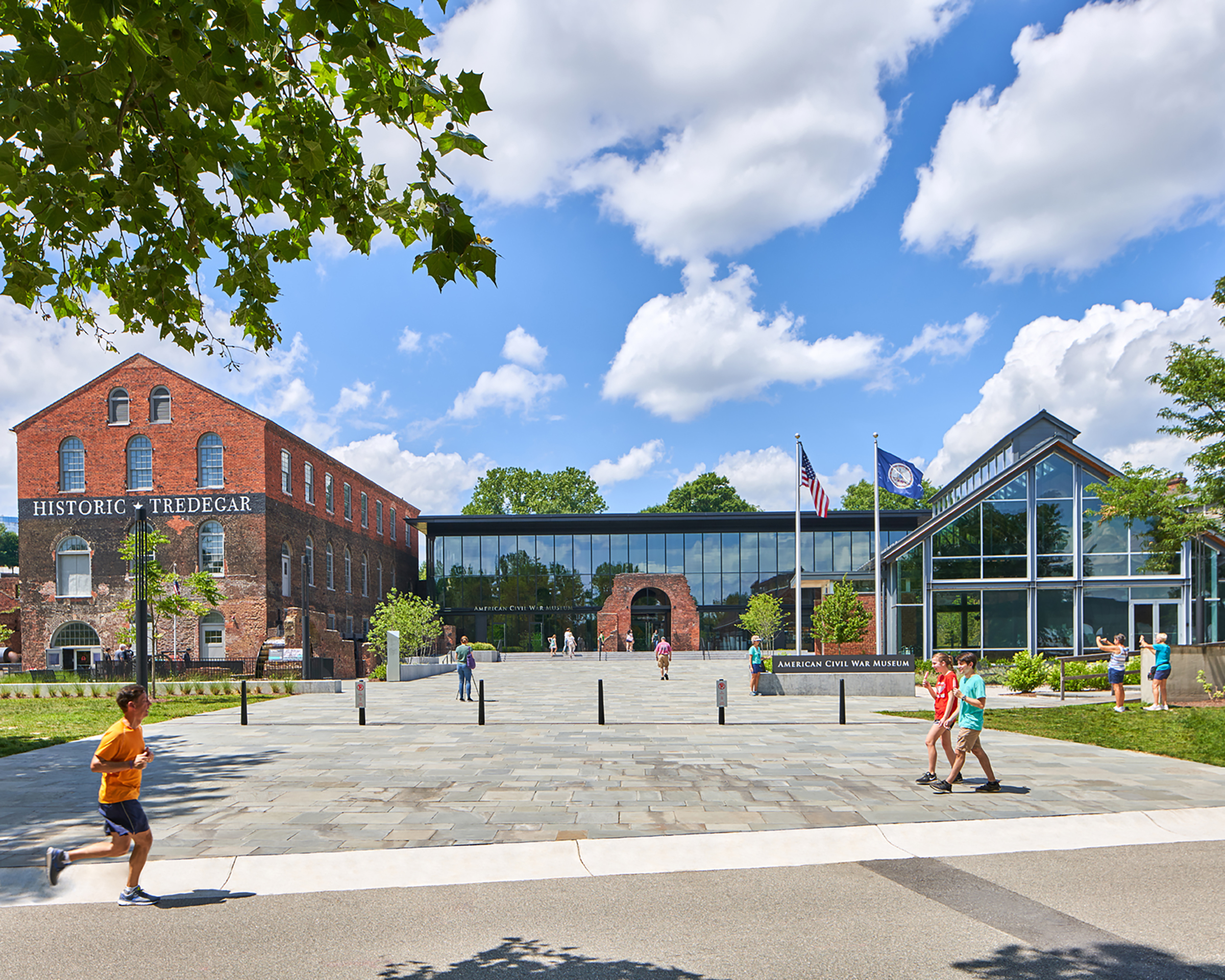 Pedestrians cross in front of the American Civil War Museum entrance.