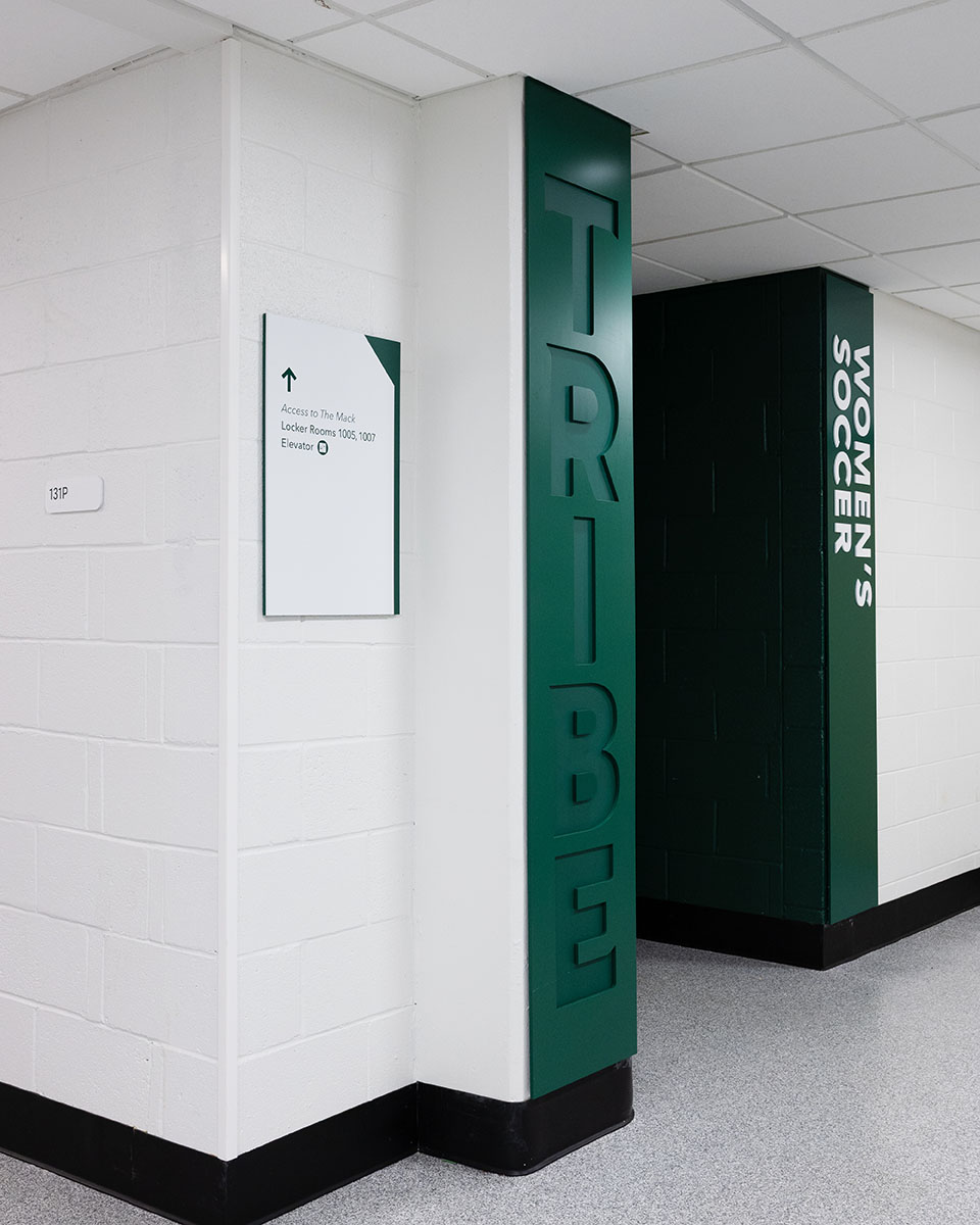 Women's soccer and directional wall signage at Kaplan Arena & The Mack