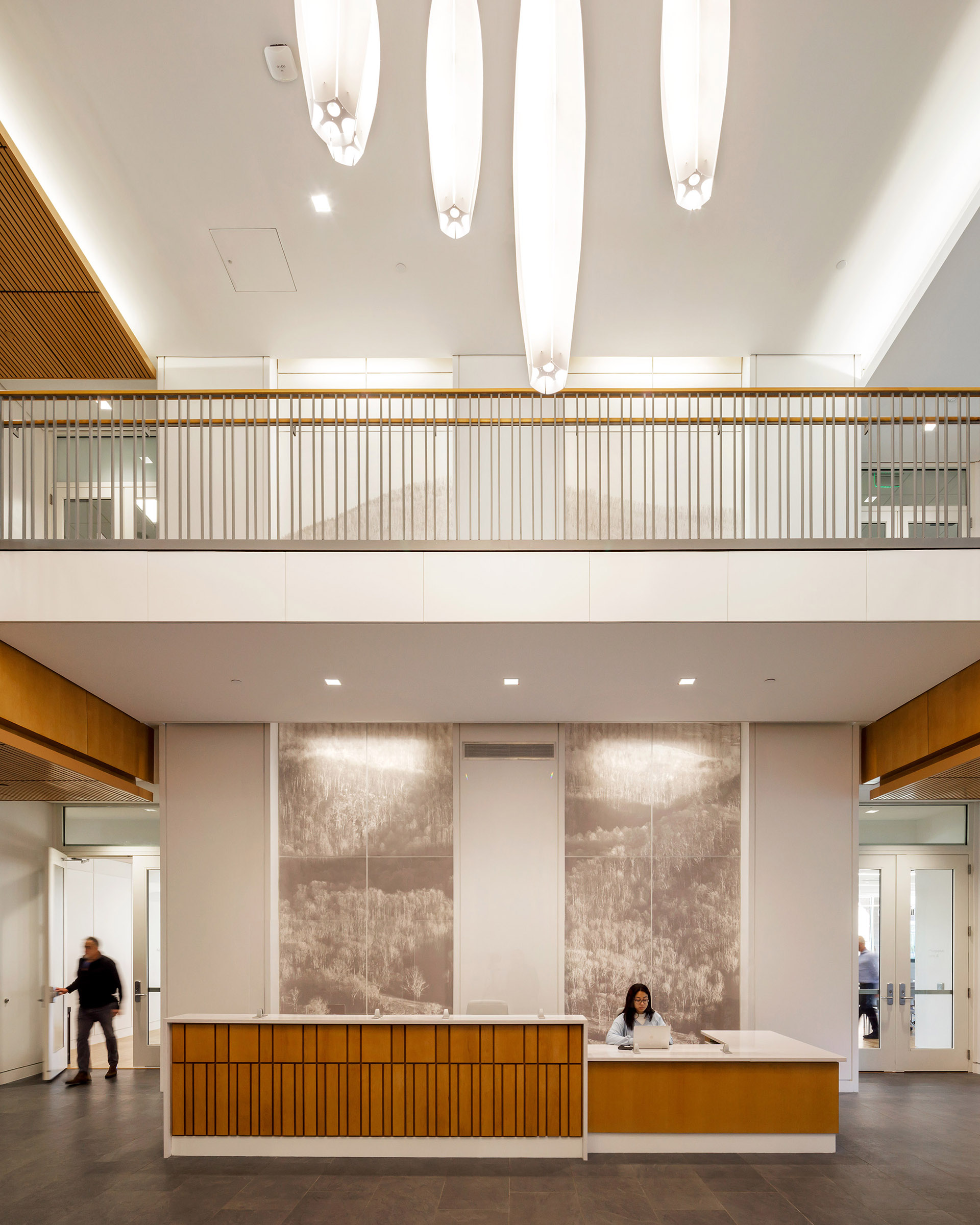 Student Health & Wellness Center Lobby featuring wall graphics behind the welcome desk