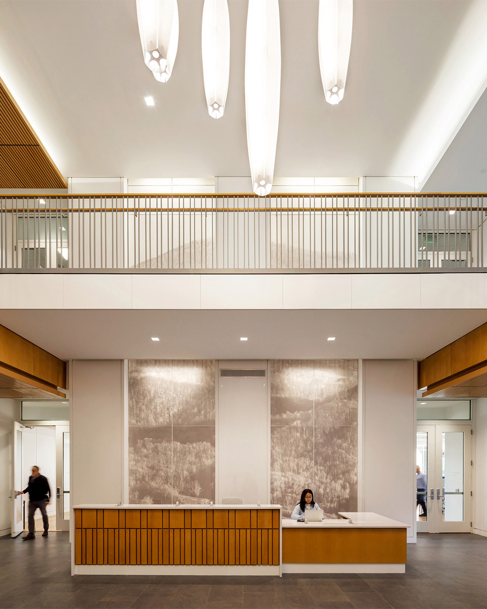 Student Health & Wellness Center Lobby featuring wall graphics behind the welcome desk