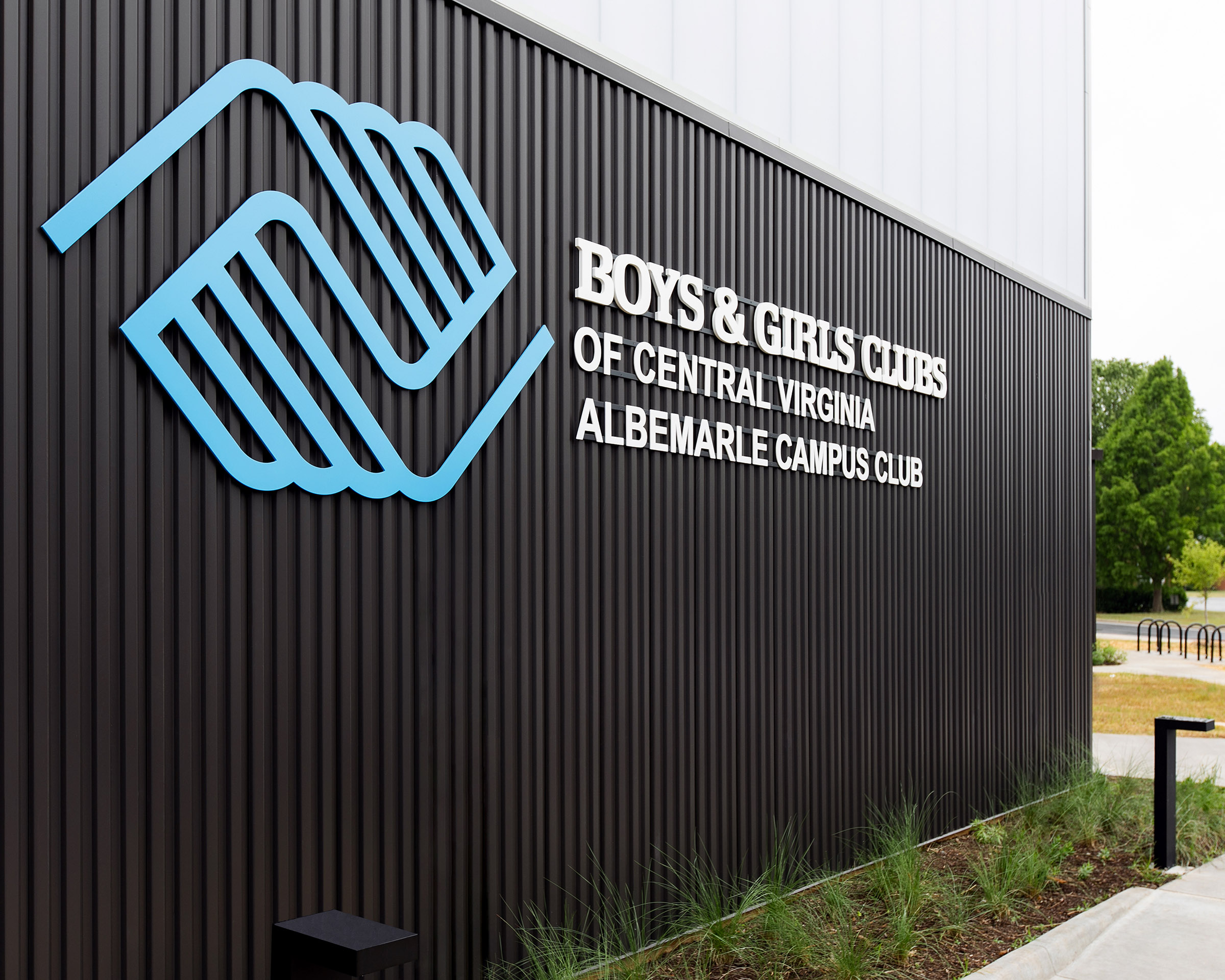 Exterior logo signage on a wall at the Boys & Girls Club’s Albemarle Campus