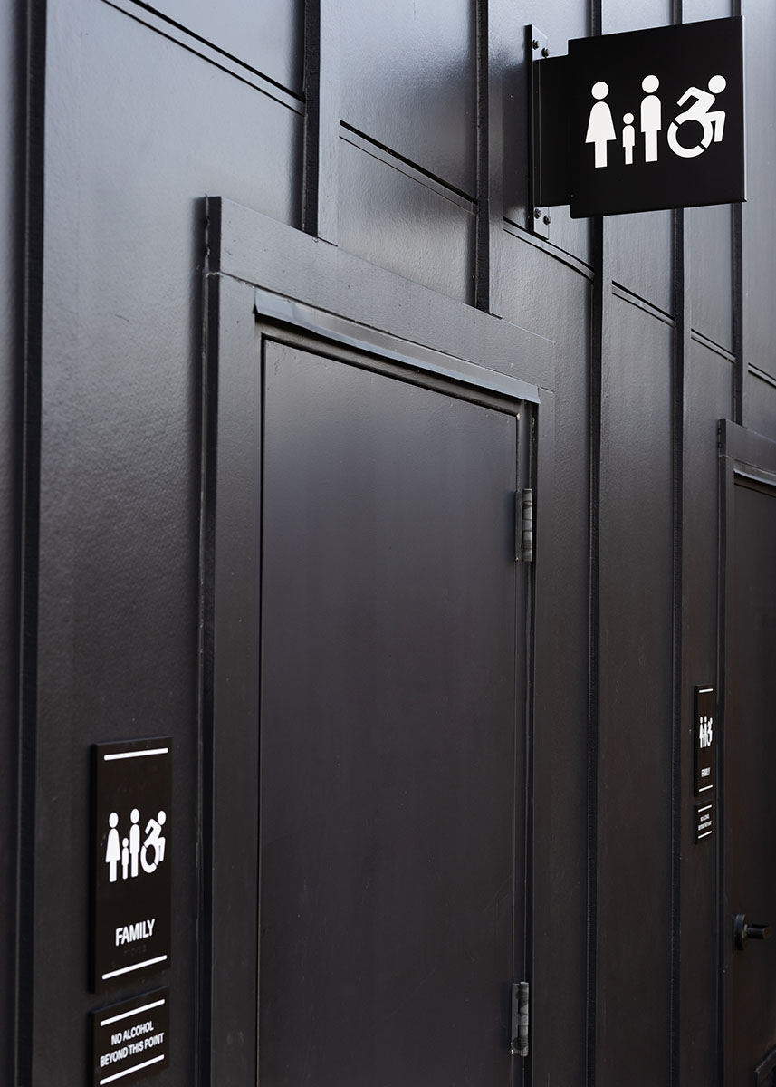 Overhead restroom signage at Allianz Amphitheater