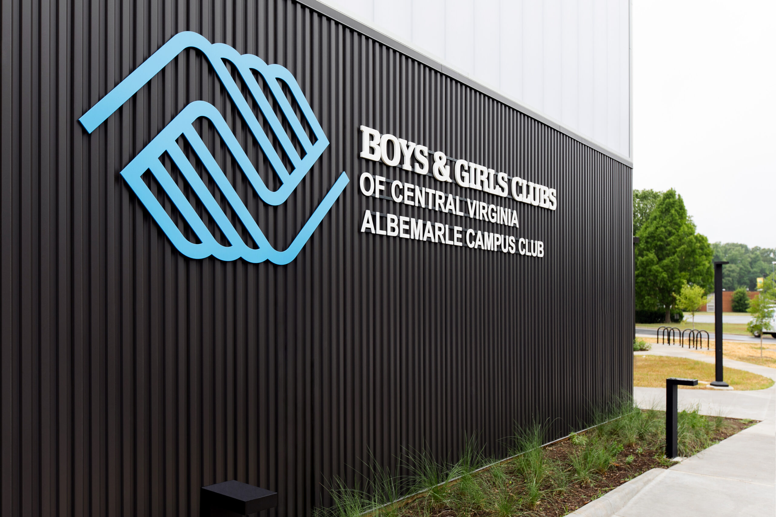 Exterior logo signage on a wall at the Boys & Girls Club’s Albemarle Campus