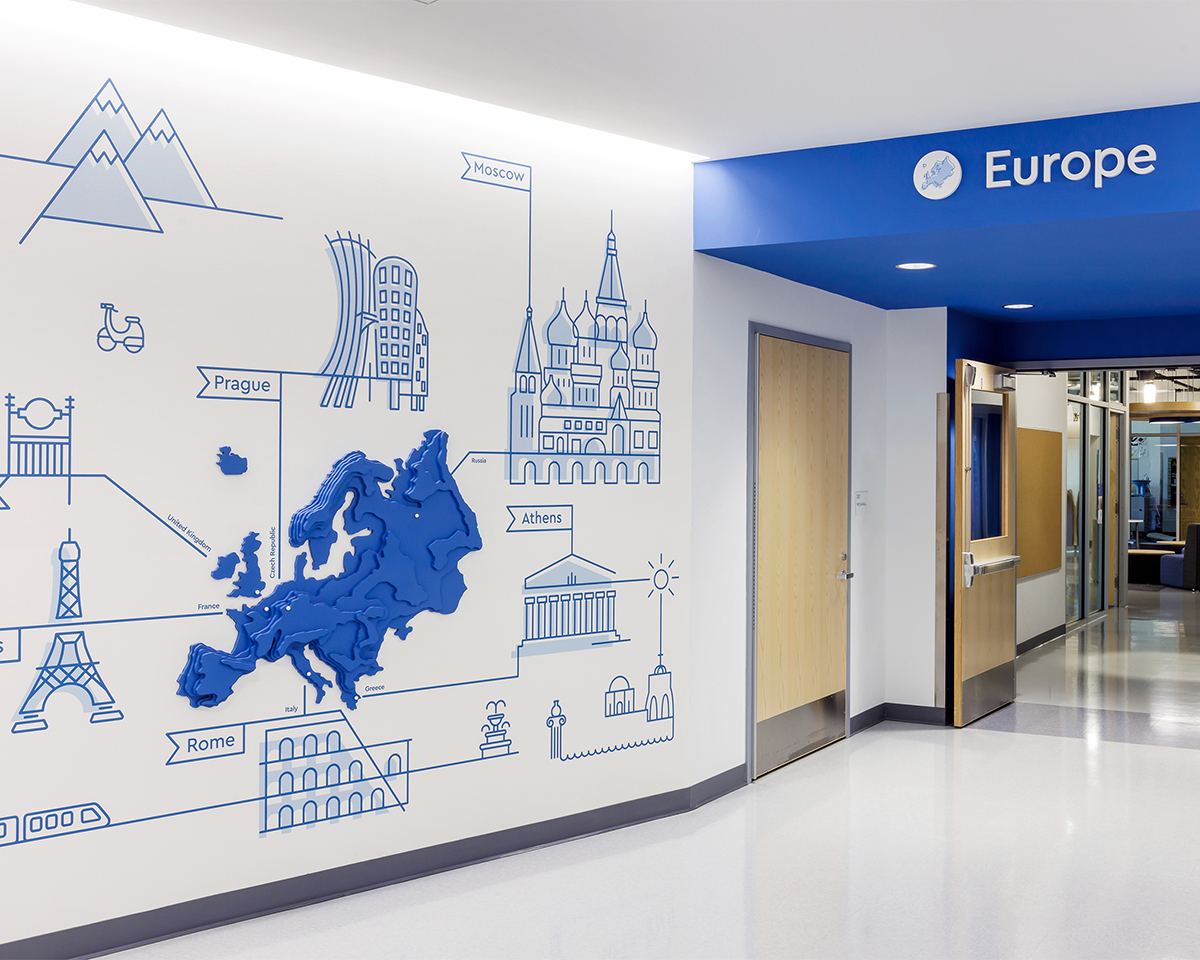 Topographical blue wall graphic of Europe at Cardinal Elementary School.