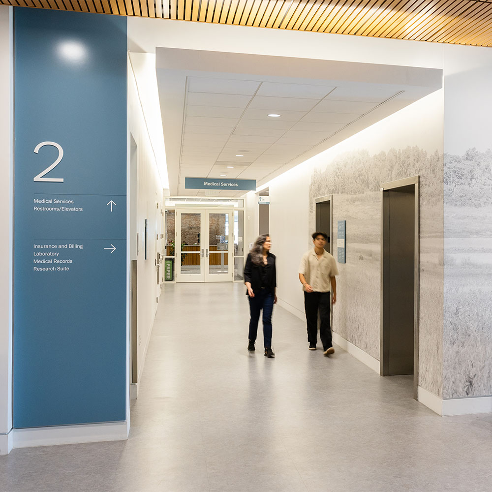 Second floor directional sign at Student Health & Wellness Center