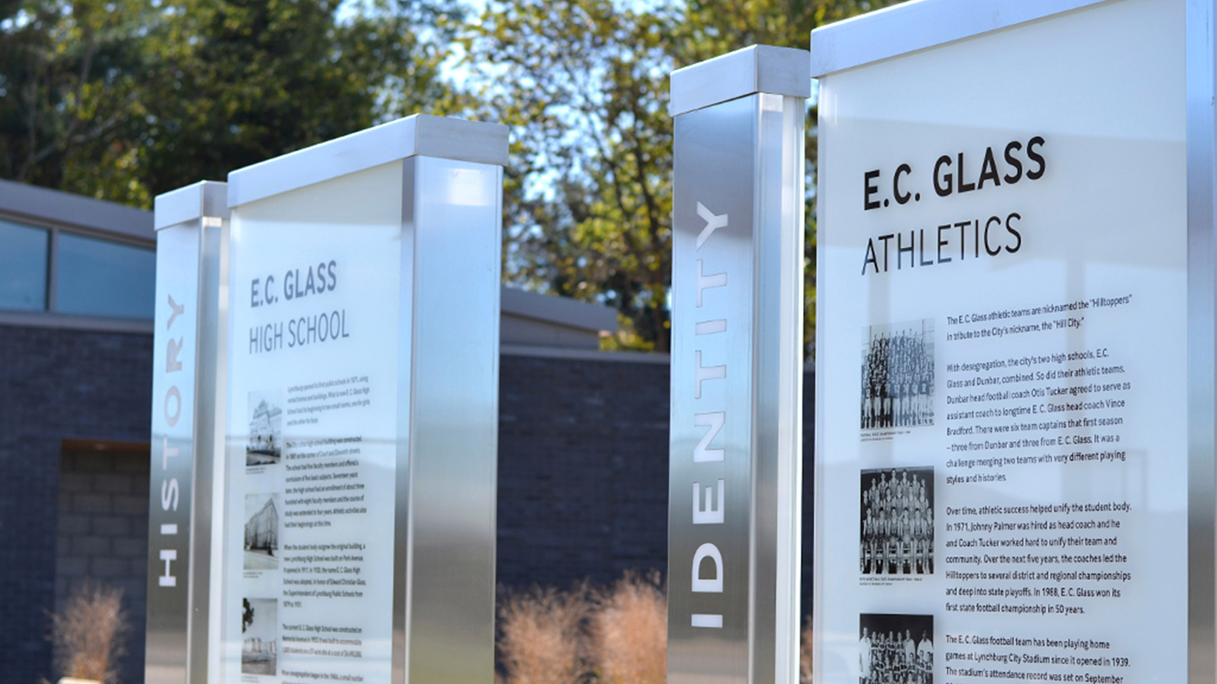 Outdoor glass signage at Lynchburg City Stadium during daytime